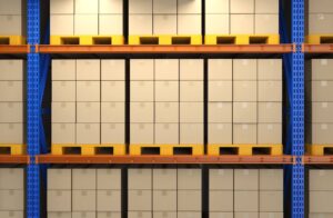 3d-rendering-warehouse-rack-full-with-cardboard-boxes Large