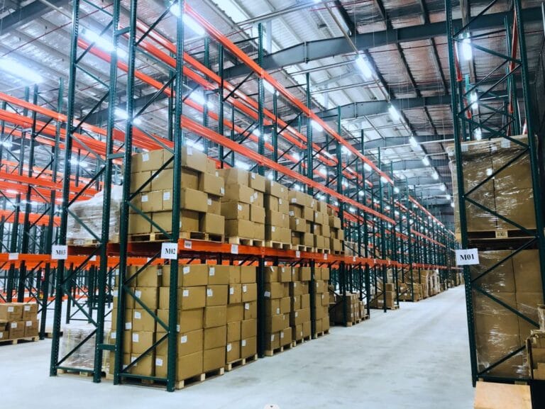 a large warehouse with boxes on shelves
